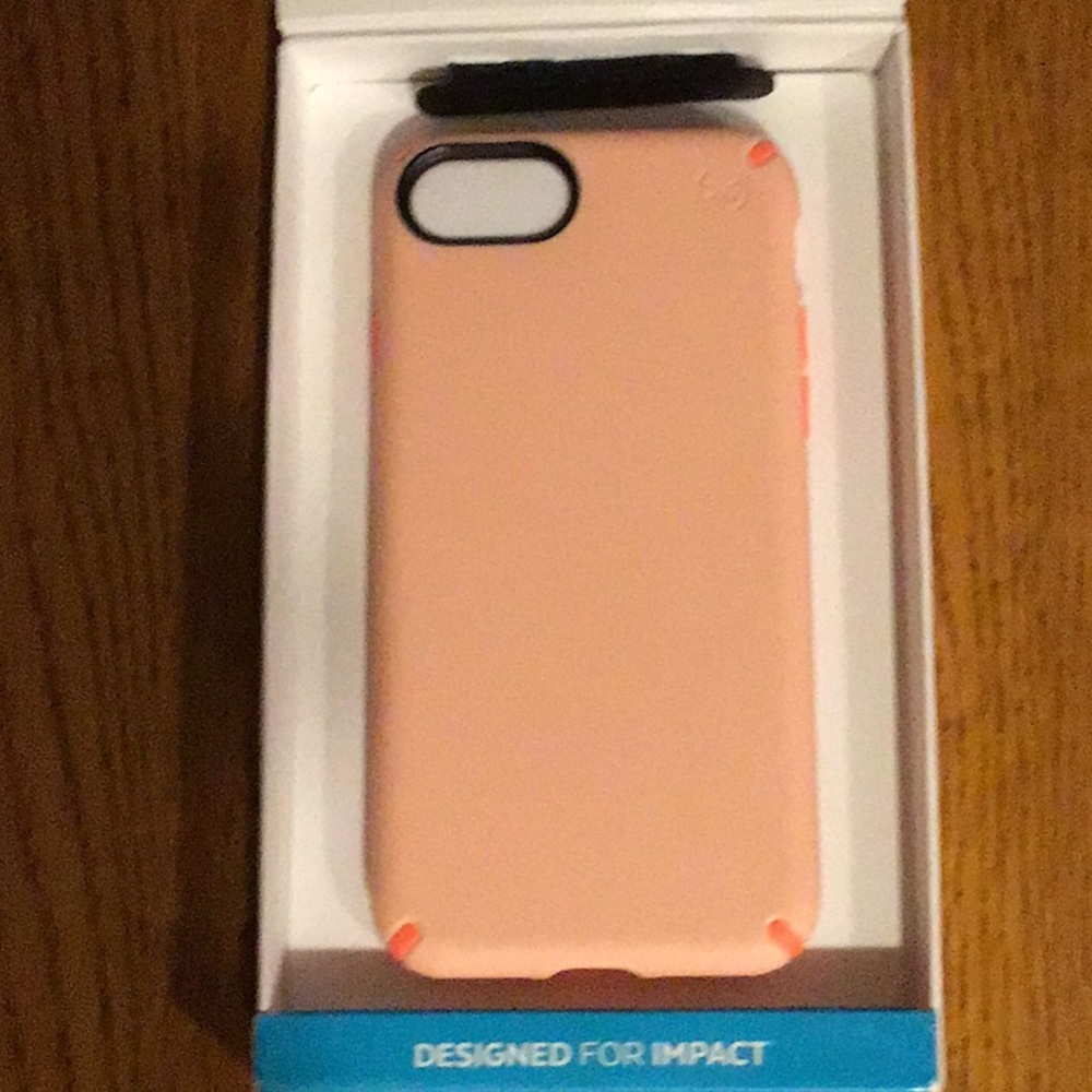 Speck! Never been out of the box! I phone 7 case